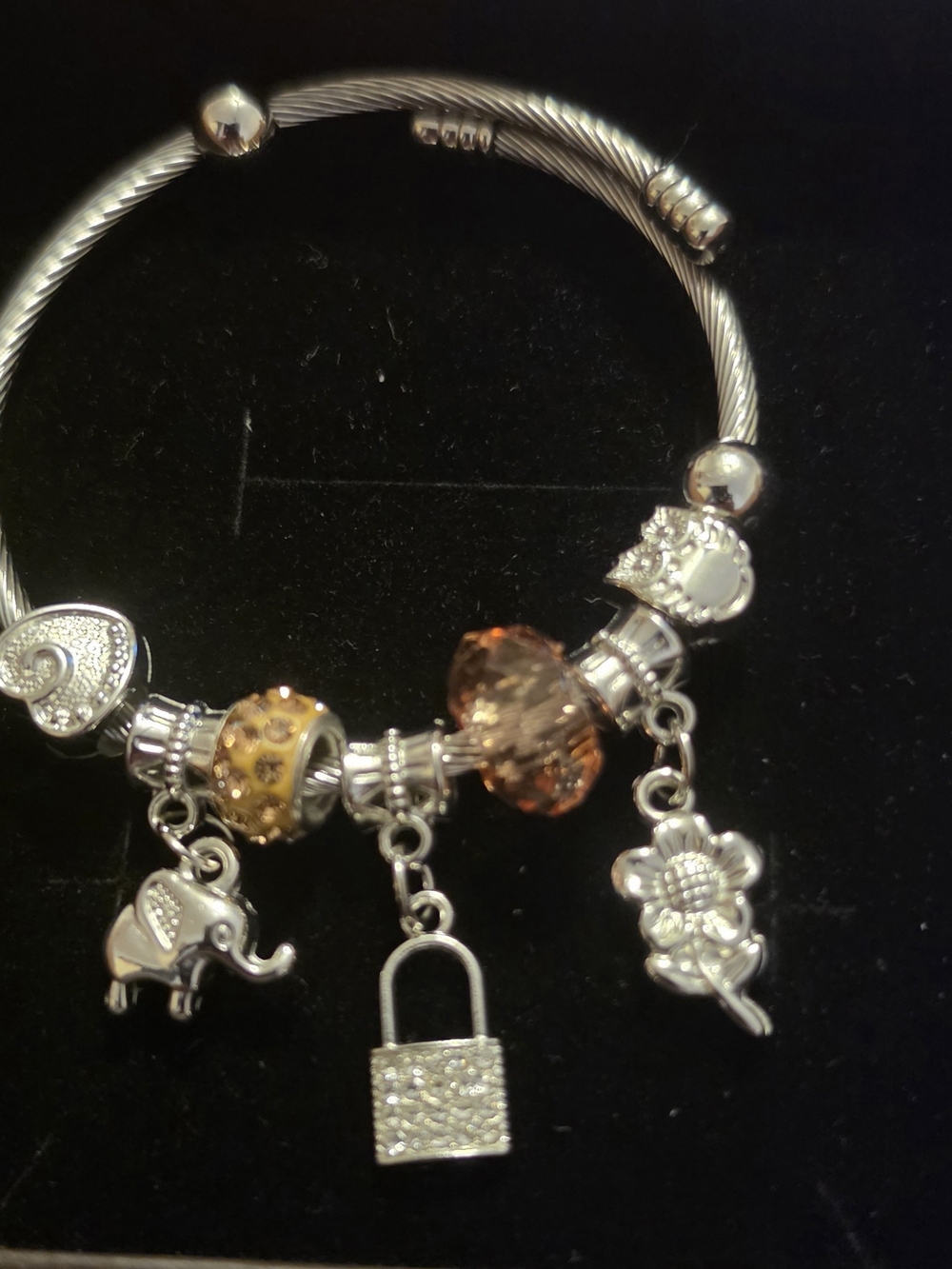 Silver Charm Bracelet with Amber and Gold Accents